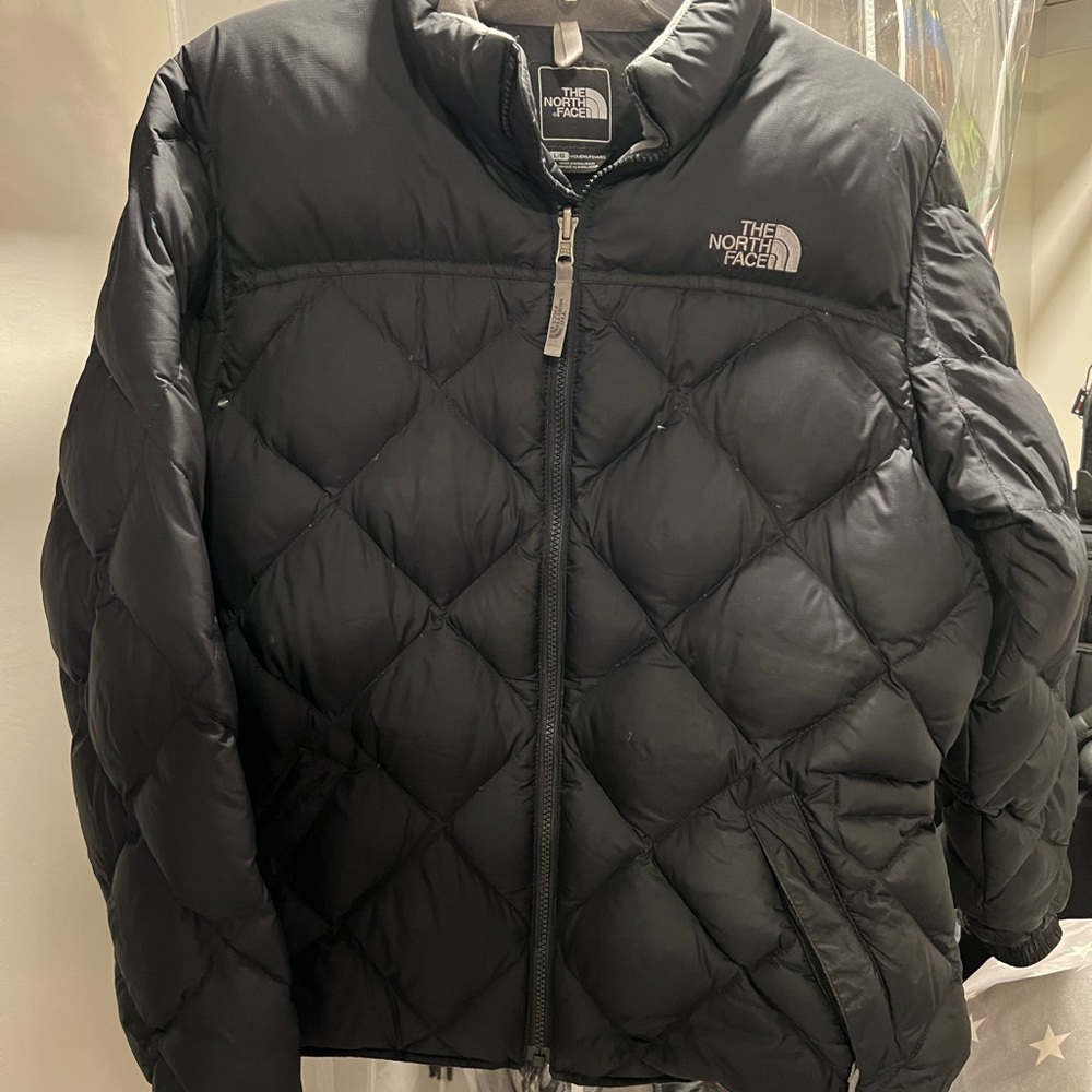 North Face women’s quilted puffy jacket with pickets and cinched waist